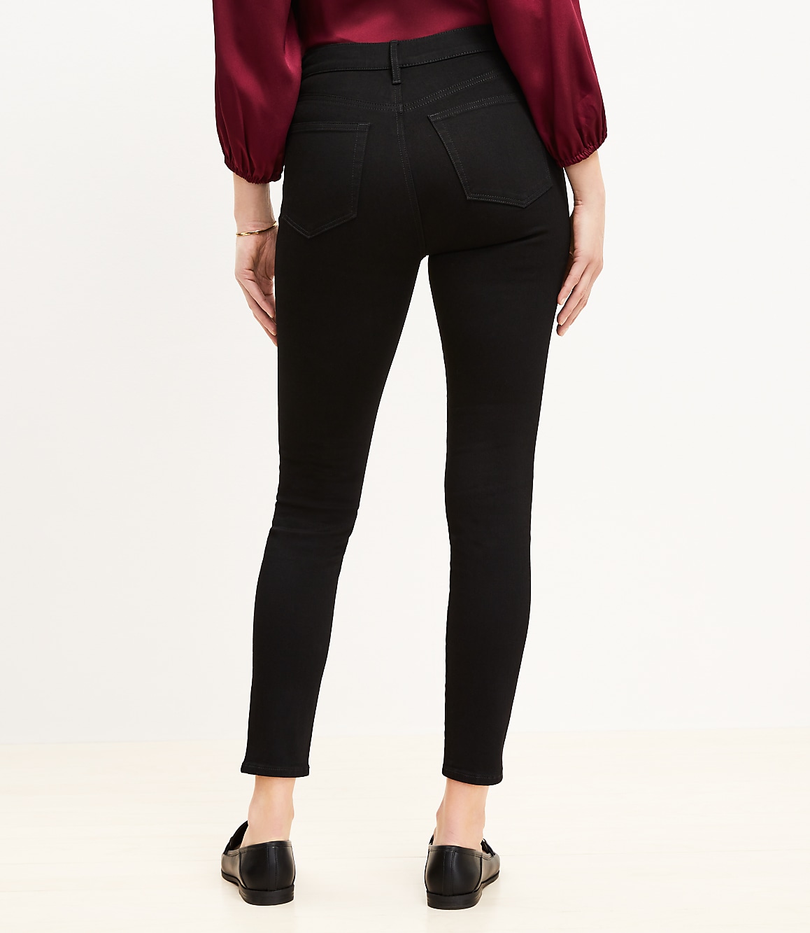 Petite High Rise Skinny Jeans in Black