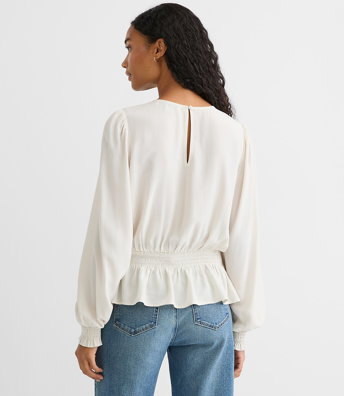 Embroidered Smocked Peplum Blouse