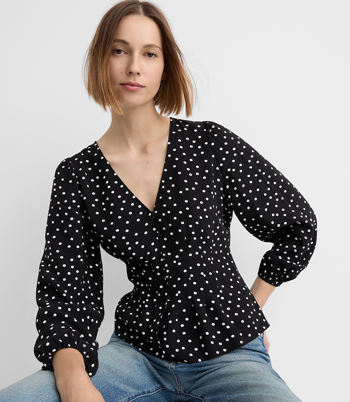 Dotted Pleated Peplum Blouse