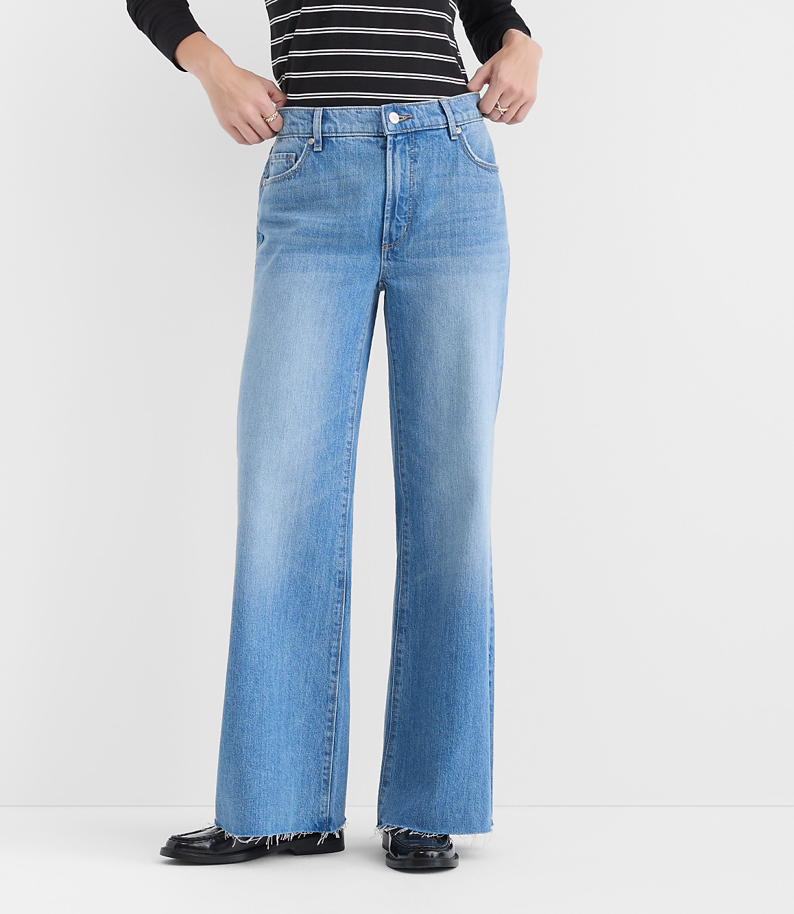 Rivete Petite Fresh Cut Mid Rise Loose Flare Jeans in Light Wash