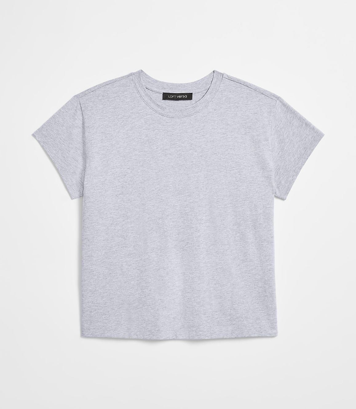 A plain grey t-shirt with a small black tag is laid flat against a white background.