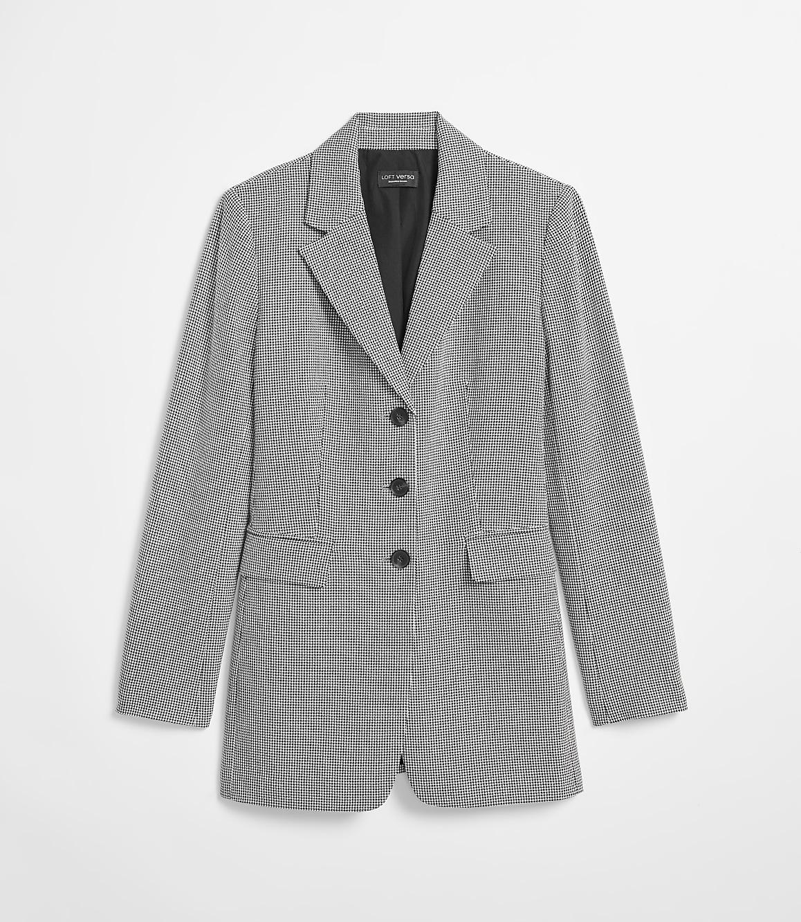 A black and white patterned blazer with three buttons is displayed against a plain white background.