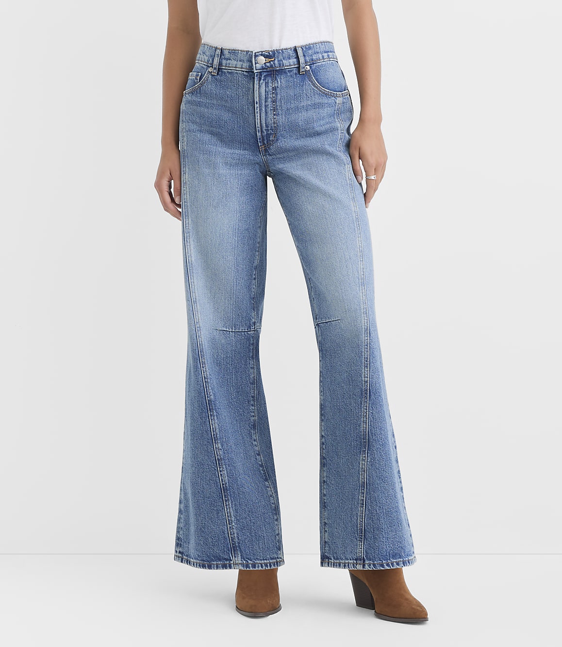Rivete Petite Seamed Mid Rise Relaxed Flare Jeans in Classic Light Indigo