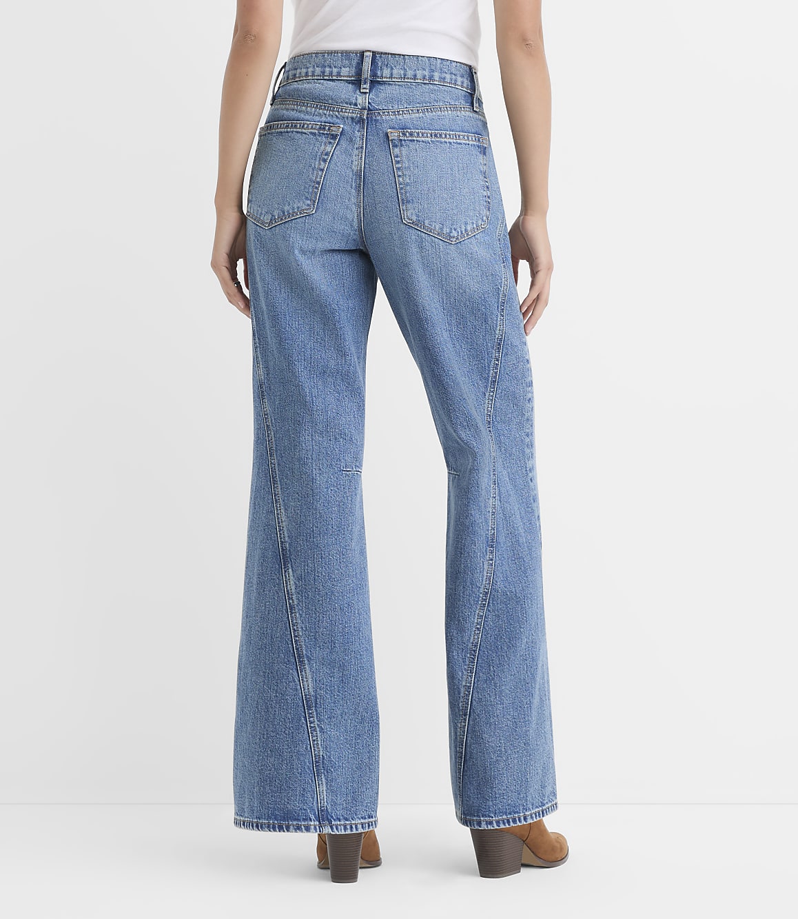 Rivete Petite Seamed Mid Rise Relaxed Flare Jeans in Classic Light Indigo