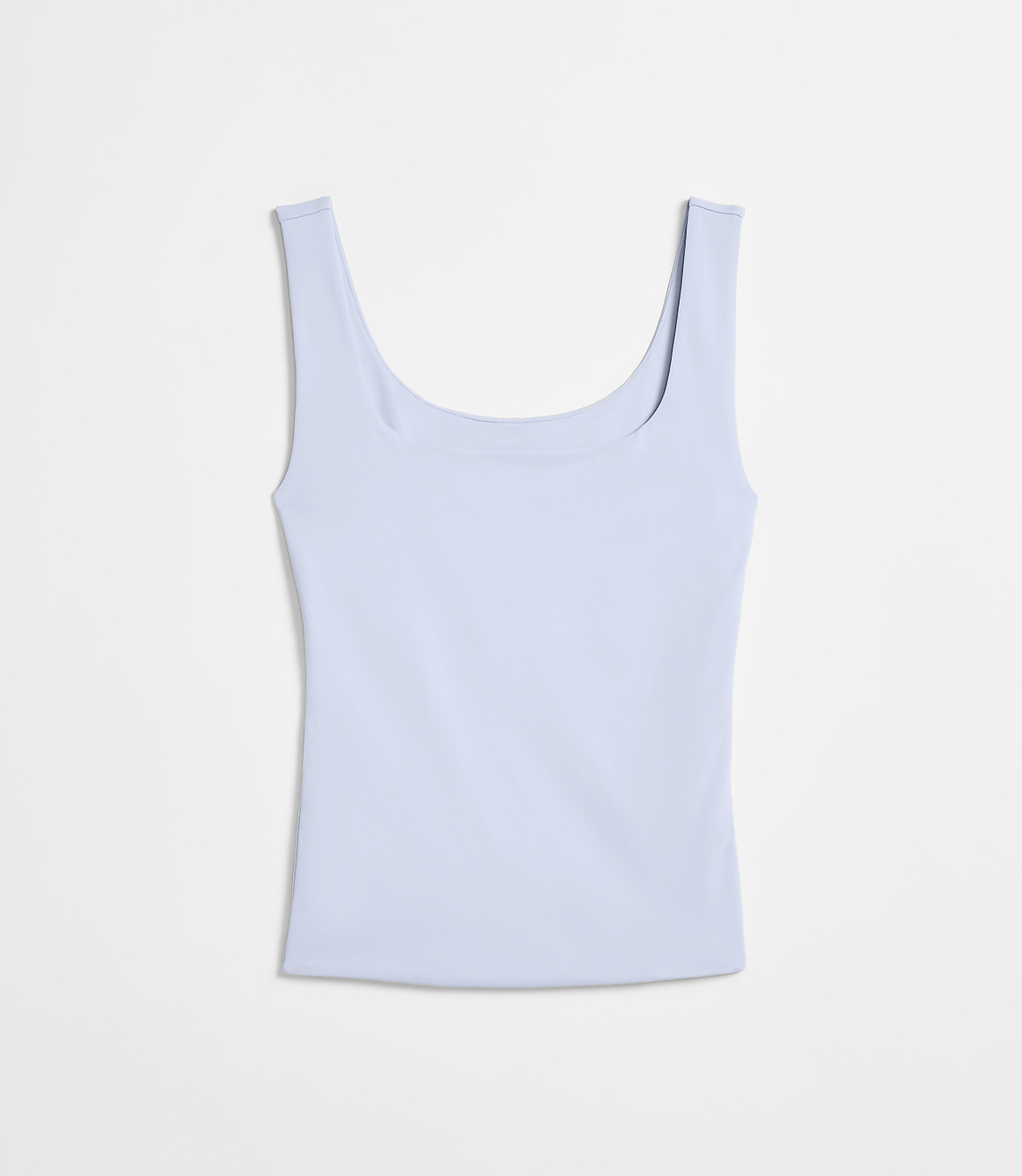 A light blue tank top lies flat against a white background.