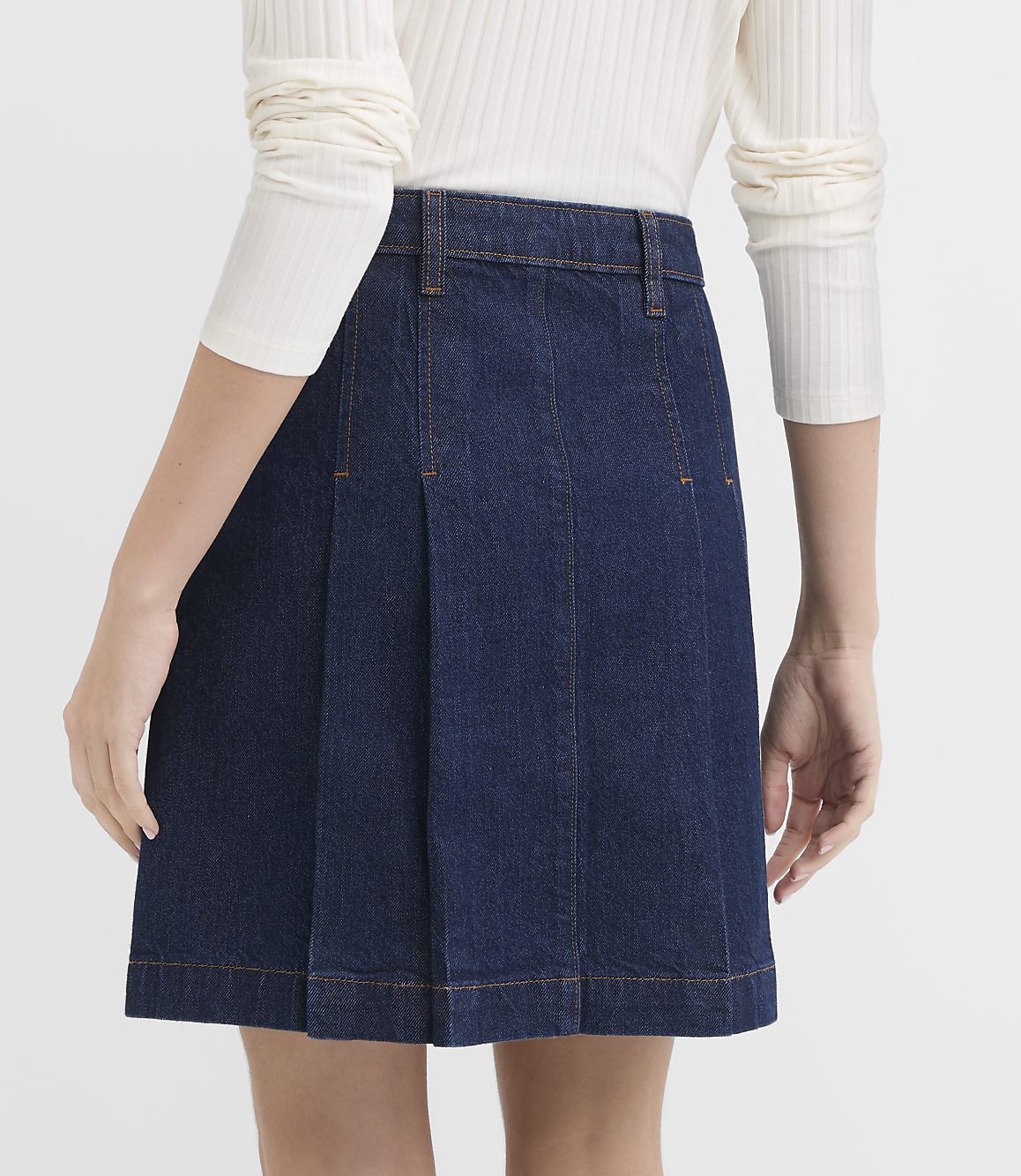 Petite Faux Leather Buckle Pleated Denim Mini Skirt in Classic Rinse Wash