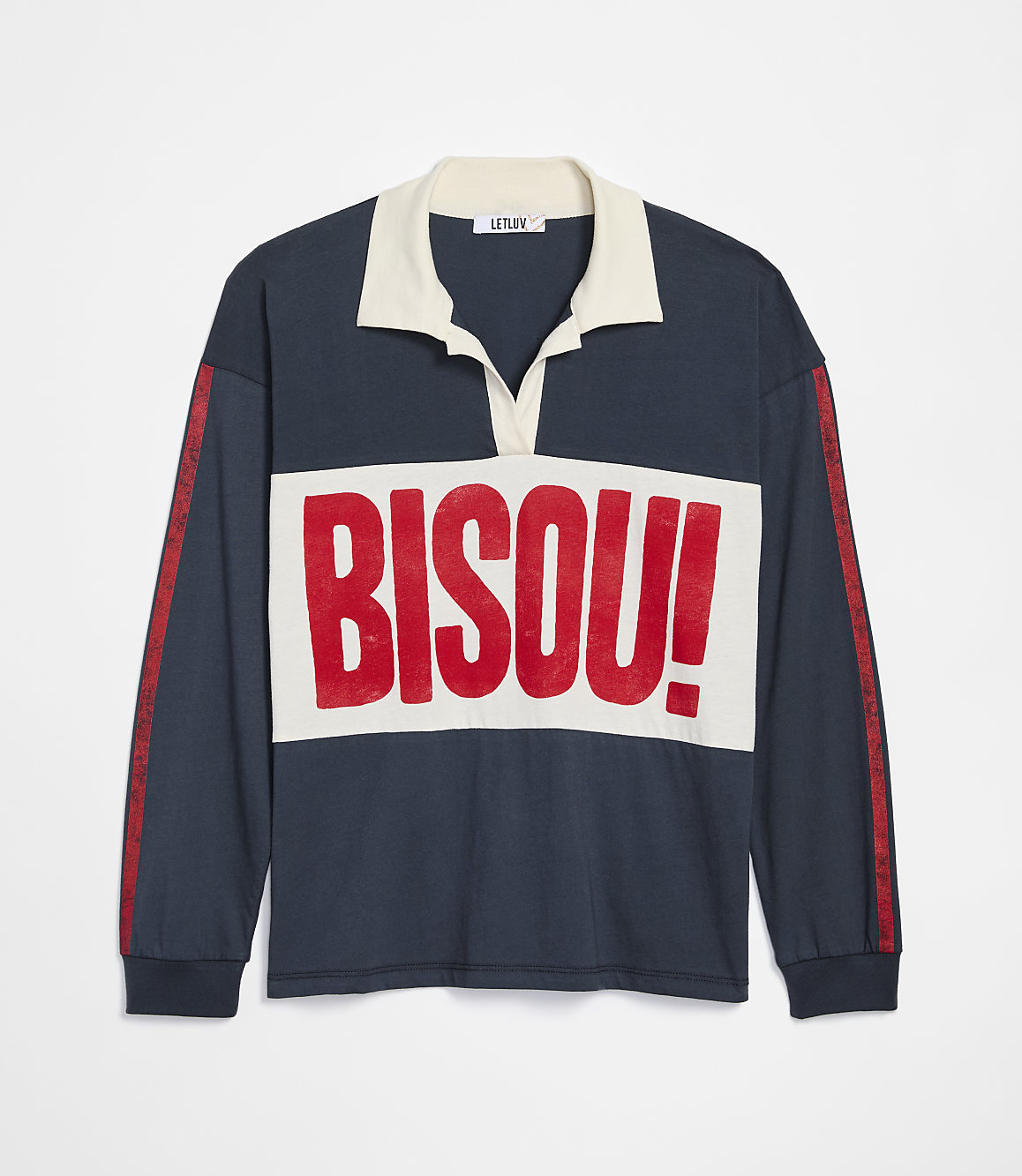 A navy blue long-sleeved rugby shirt with a cream collar and a cream chest panel featuring the red text "BISOU!" is displayed against a plain white background.