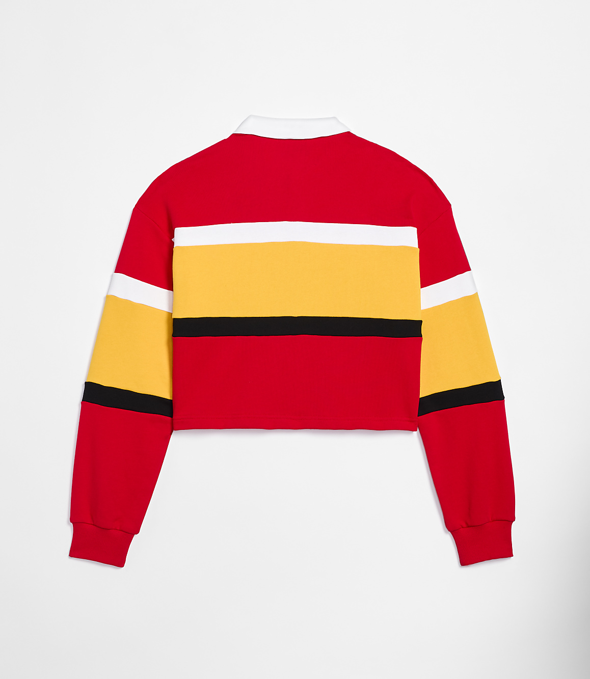 A red, yellow, and white striped cropped rugby shirt is displayed against a plain white background.