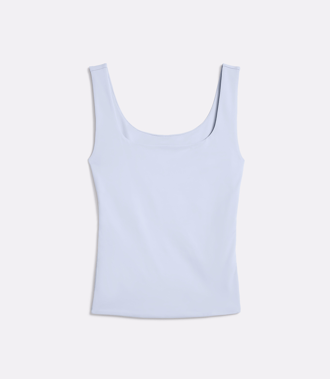 A light blue tank top lies flat against a white background.
