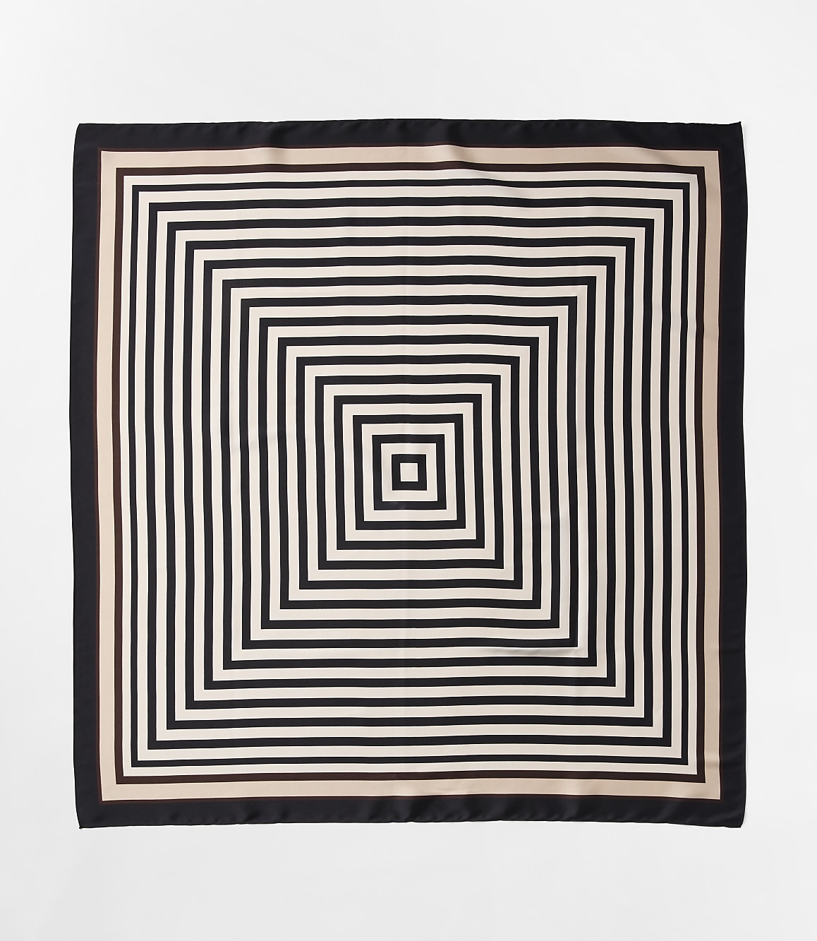 A square scarf with a concentric square pattern in black and white is laid flat against a plain white background.