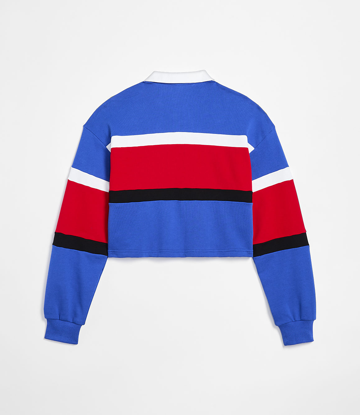 A cropped, long-sleeved rugby shirt with blue, white, and red stripes is displayed against a plain white background.