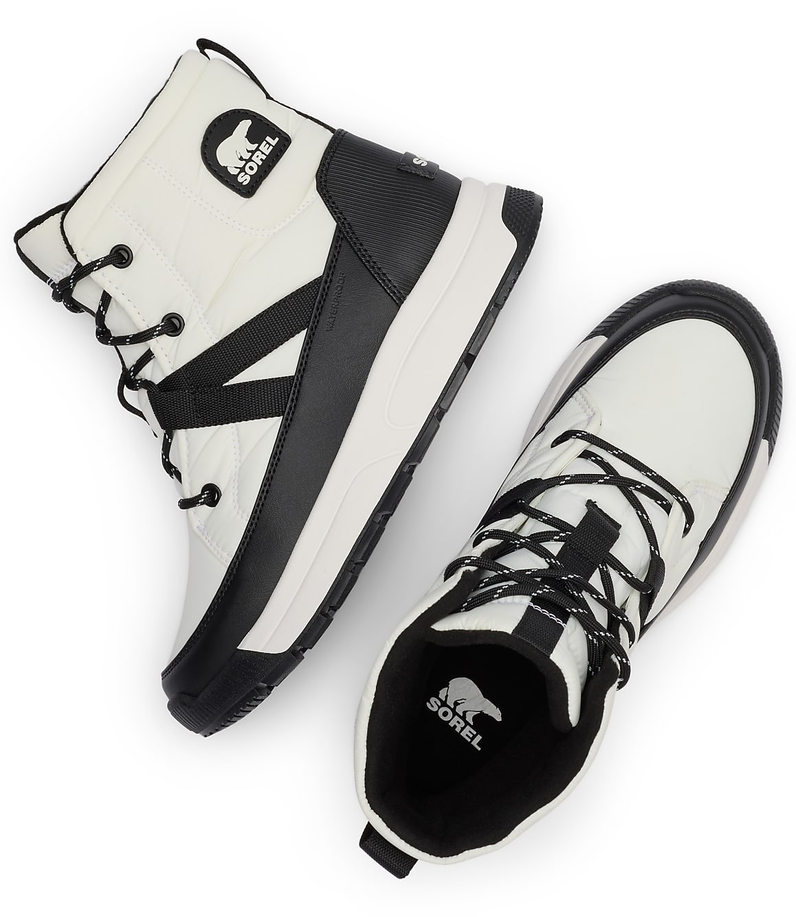 A pair of white and black Sorel boots with black laces are arranged on a white background.