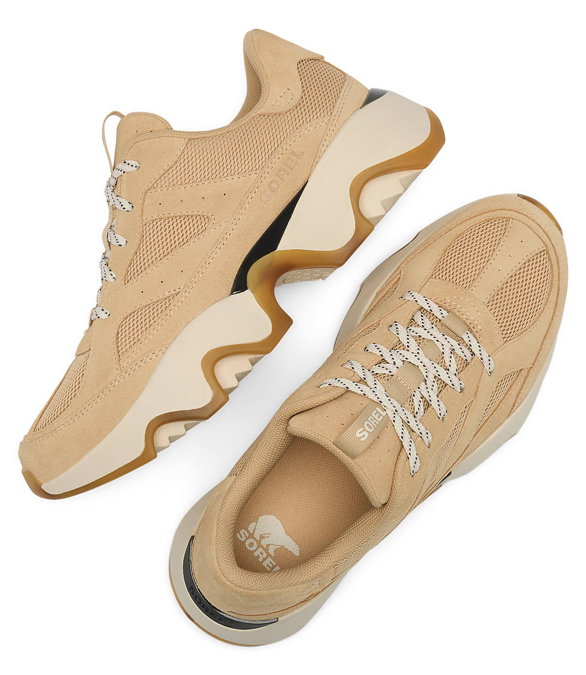 Two tan Sorel sneakers with white laces rest on a white background.