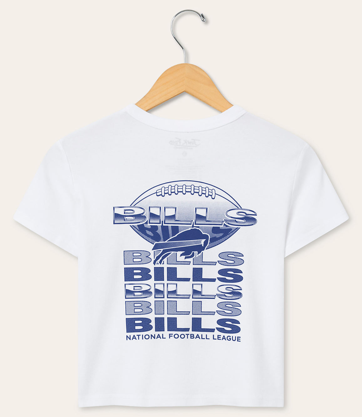 A white t-shirt with a Buffalo Bills logo and repeated "BILLS" text is displayed on a wooden hanger against a plain white background.
