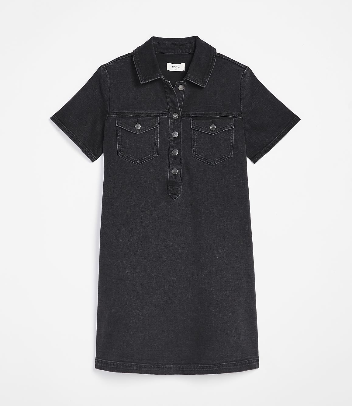 A dark wash denim shirtdress with button detailing and chest pockets is displayed against a plain white background.
