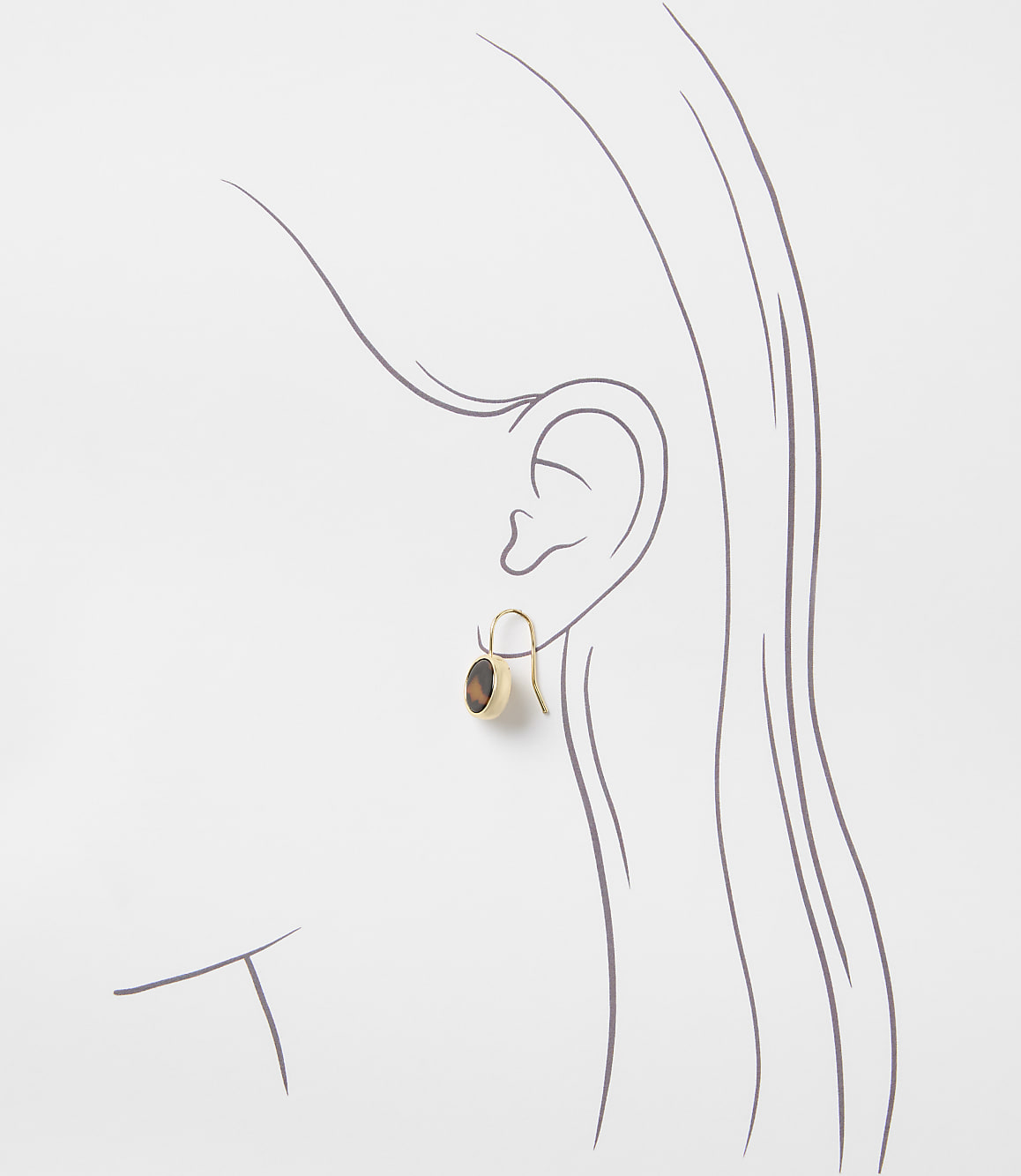 A gold earring with a brown oval stone hangs from a stylized ear and neck against a white background.
