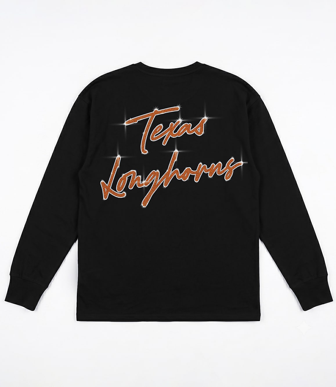 A black long-sleeved shirt with "Texas Longhorns" written in sparkly copper script is displayed against a plain white background.