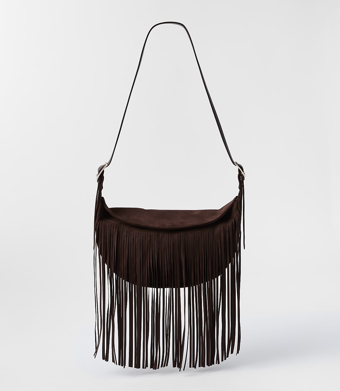 A dark brown suede fringe bag with a single strap hangs against a plain white background.