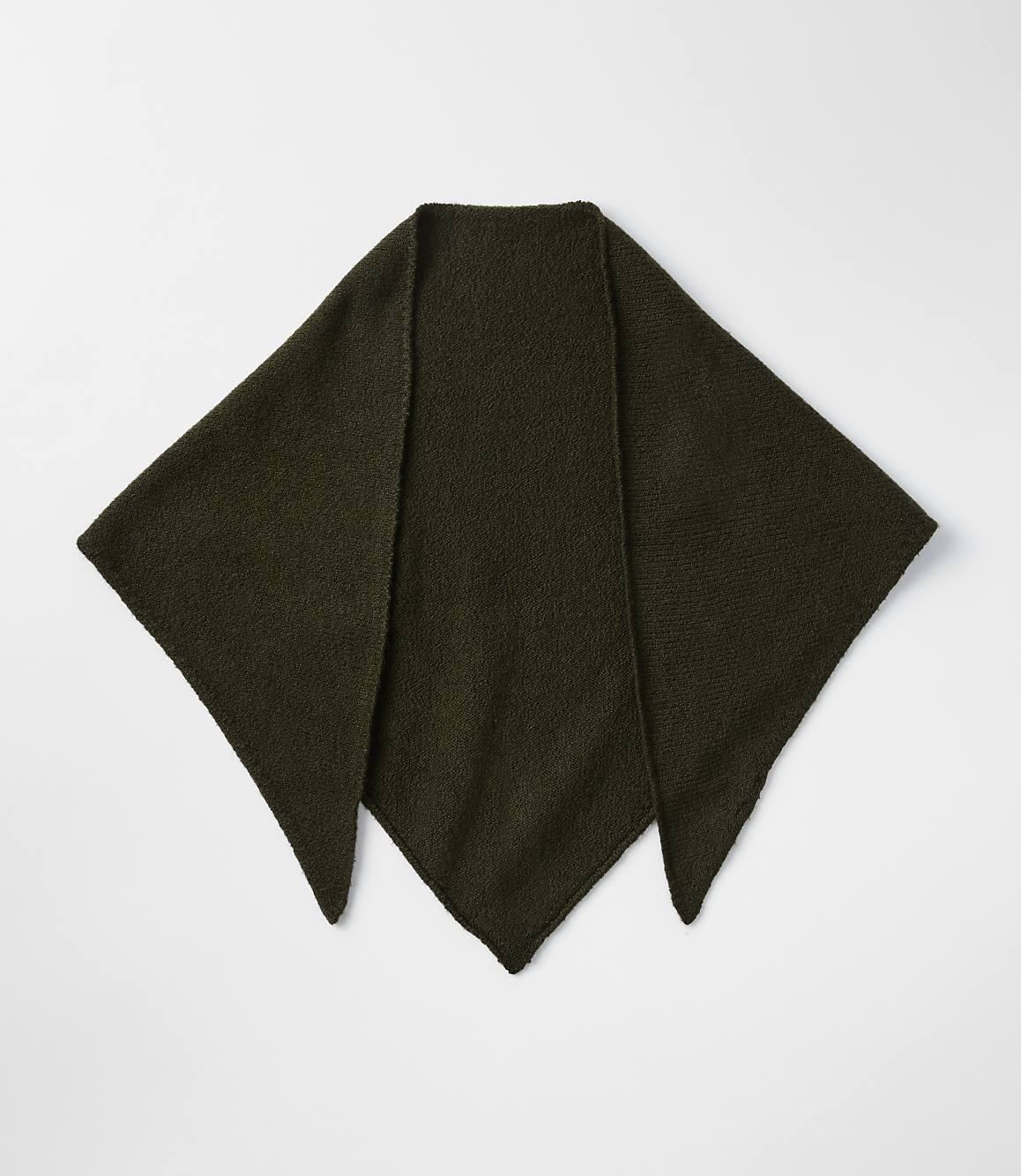 A dark green, knitted triangular shawl lies flat on a plain white background.