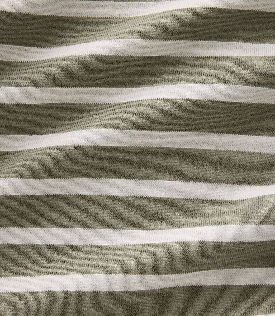 A close-up view of a fabric with horizontal stripes of olive green and white fills the frame, with the texture of the material visible throughout.