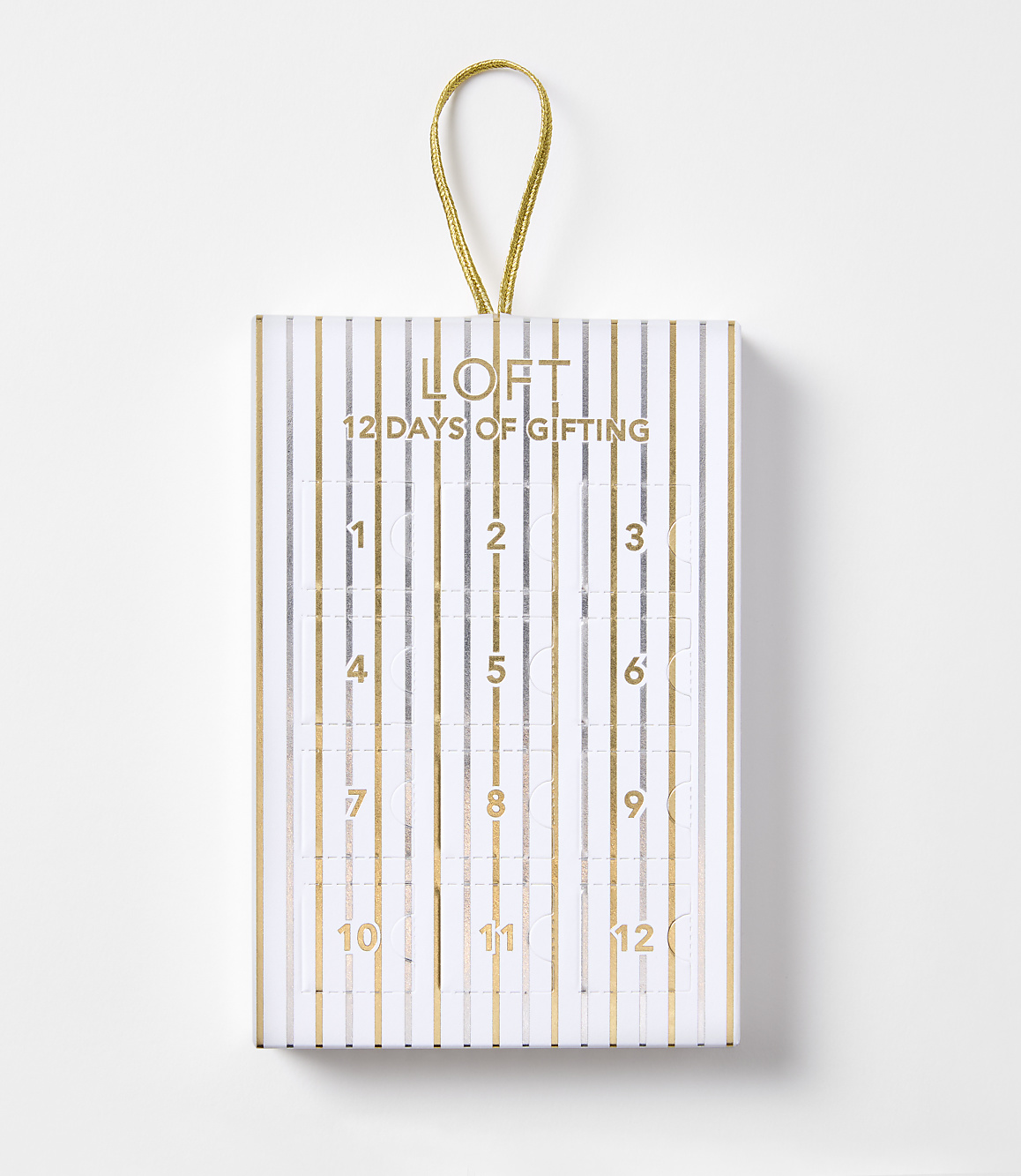A white and gold striped advent calendar with "LOFT 12 DAYS OF GIFTING" printed on the front hangs against a plain white background.