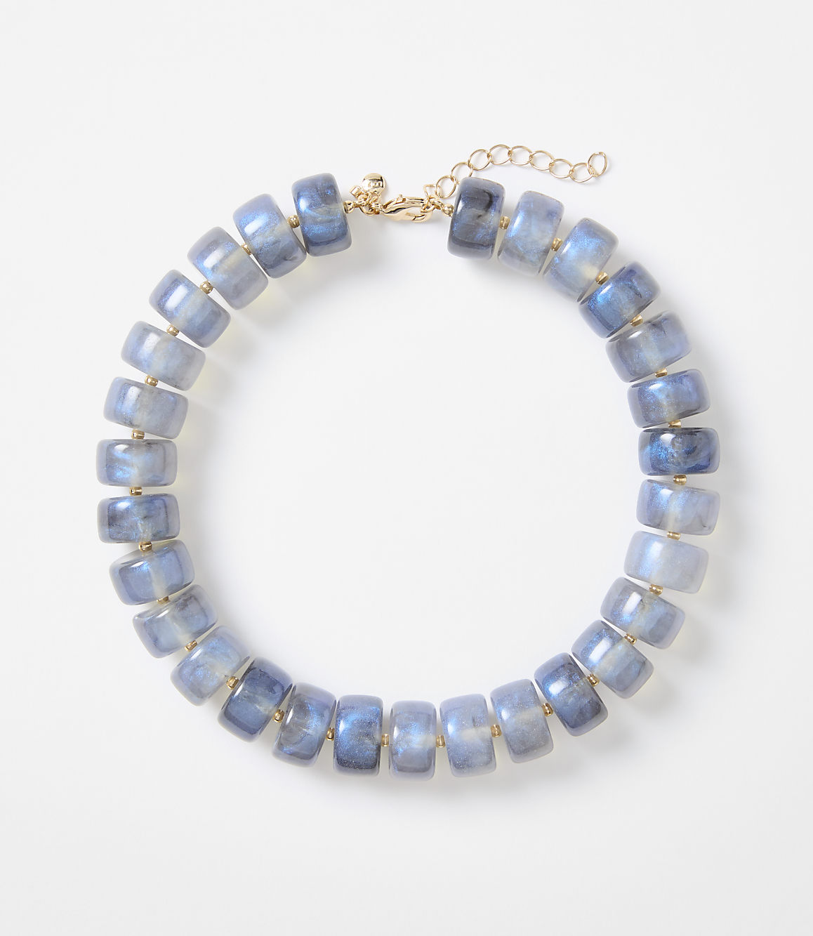 A necklace of blue, translucent, barrel-shaped beads with gold accents is displayed against a plain white background.