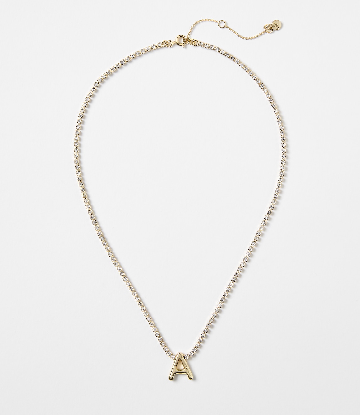 A gold letter "A" pendant hangs from a delicate, diamond-encrusted chain against a plain white background.