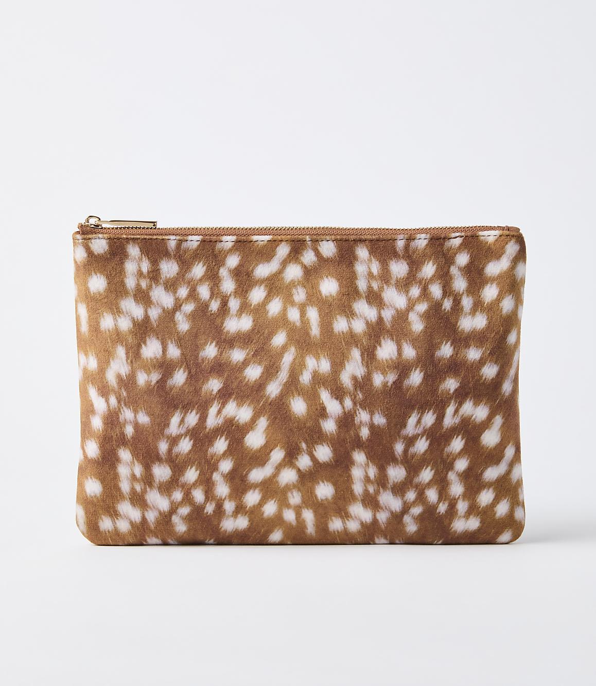 A brown and white spotted pouch rests on a plain white background.
