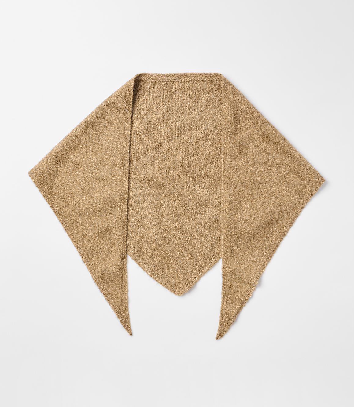 A fuzzy, tan, triangular scarf lies flat against a plain white background.