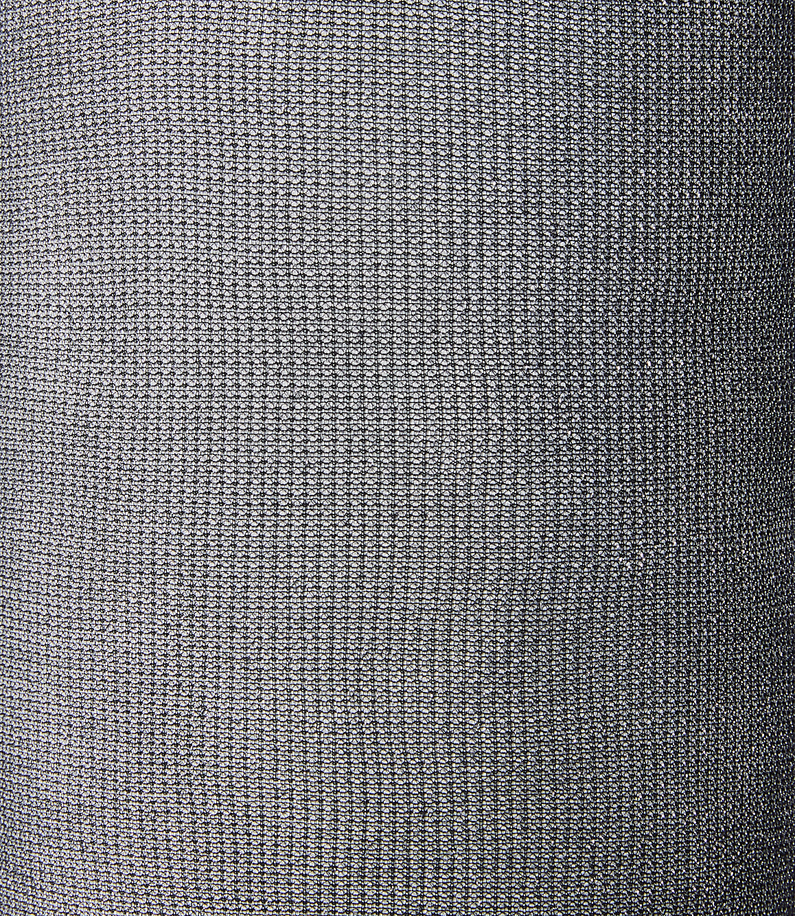 A close-up view of a gray textured fabric fills the frame, with subtle variations in light and shadow creating depth.