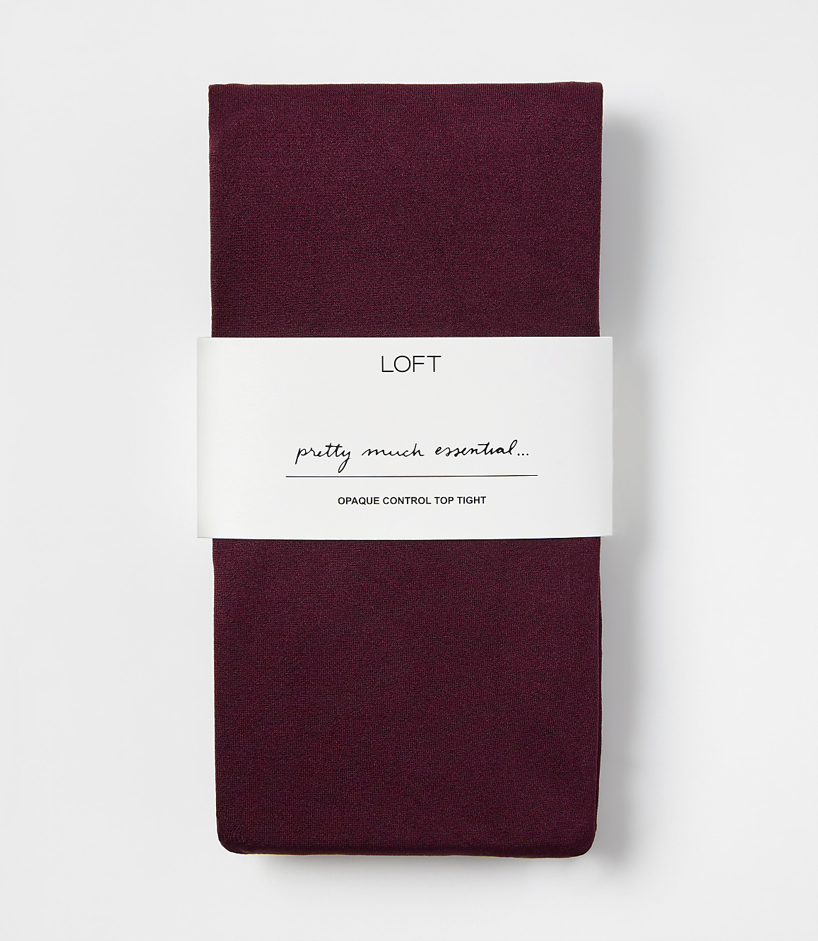 A pair of folded burgundy opaque control top tights with a white LOFT brand label centered against a plain white background.