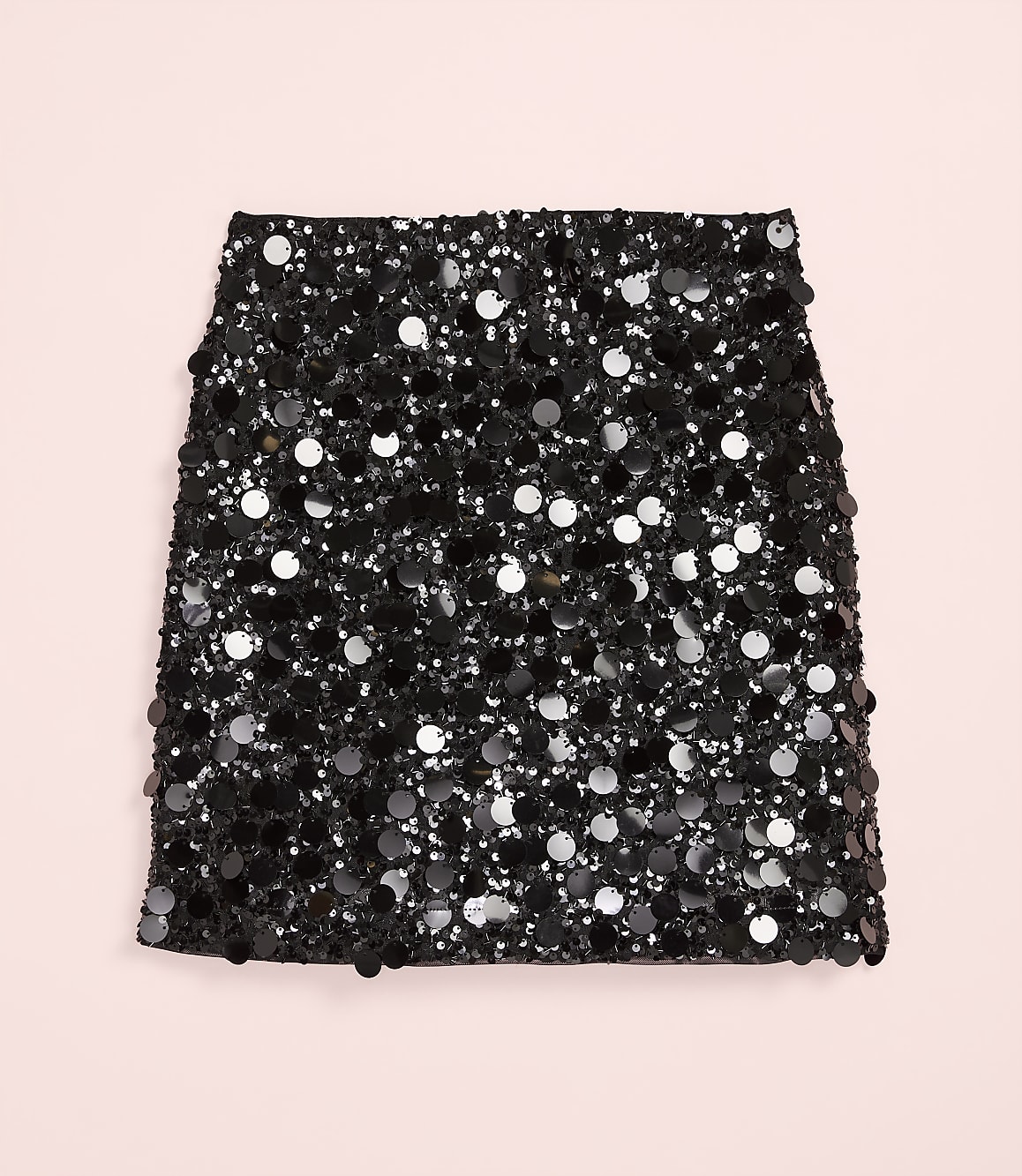 A black sequined skirt is centered against a plain light pink background.