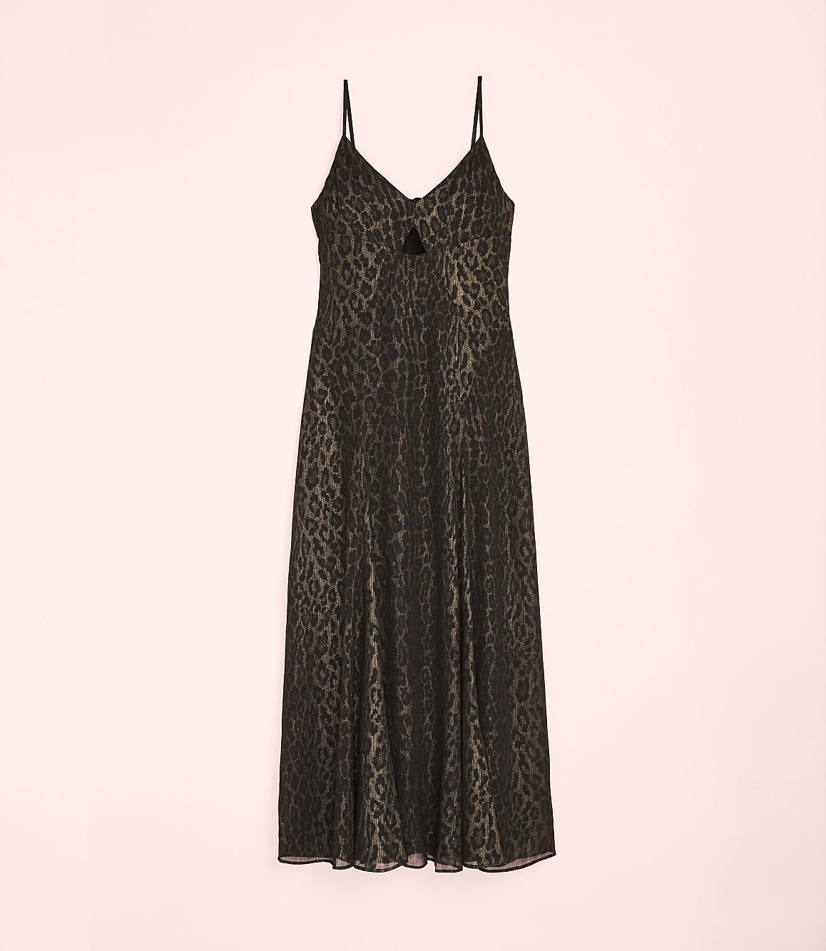 A black leopard-print slip dress hangs against a plain light pink background.