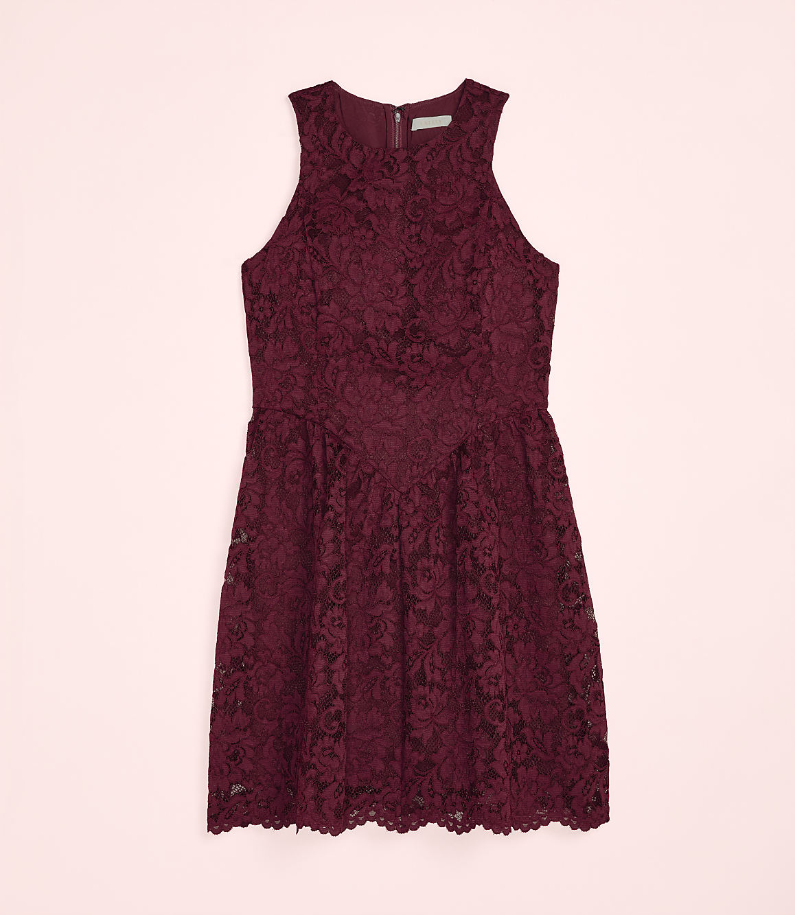 A burgundy lace dress is centered against a pale pink background.