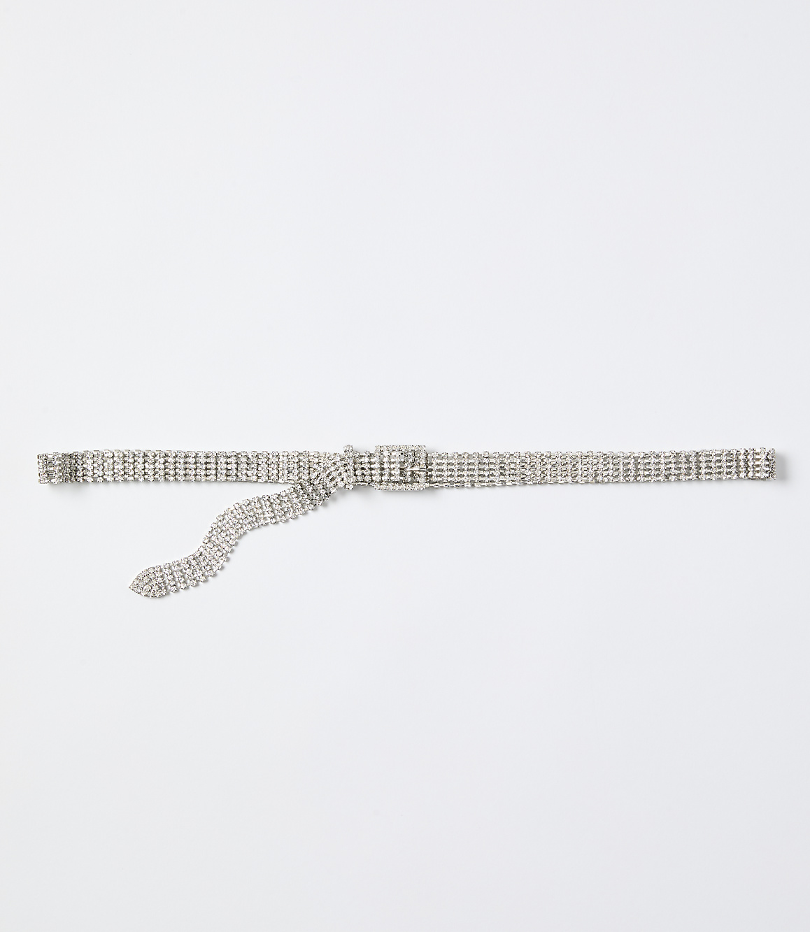 A sparkling rhinestone belt lies horizontally across a plain white background.