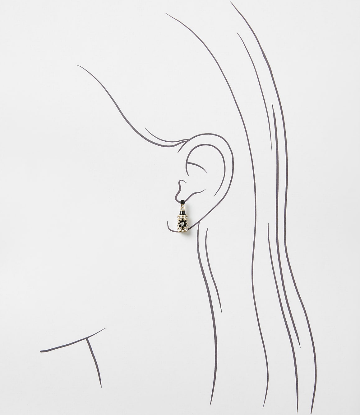 A small, ornate earring hangs from the ear of a minimalist line drawing of a woman's profile against a plain white background.