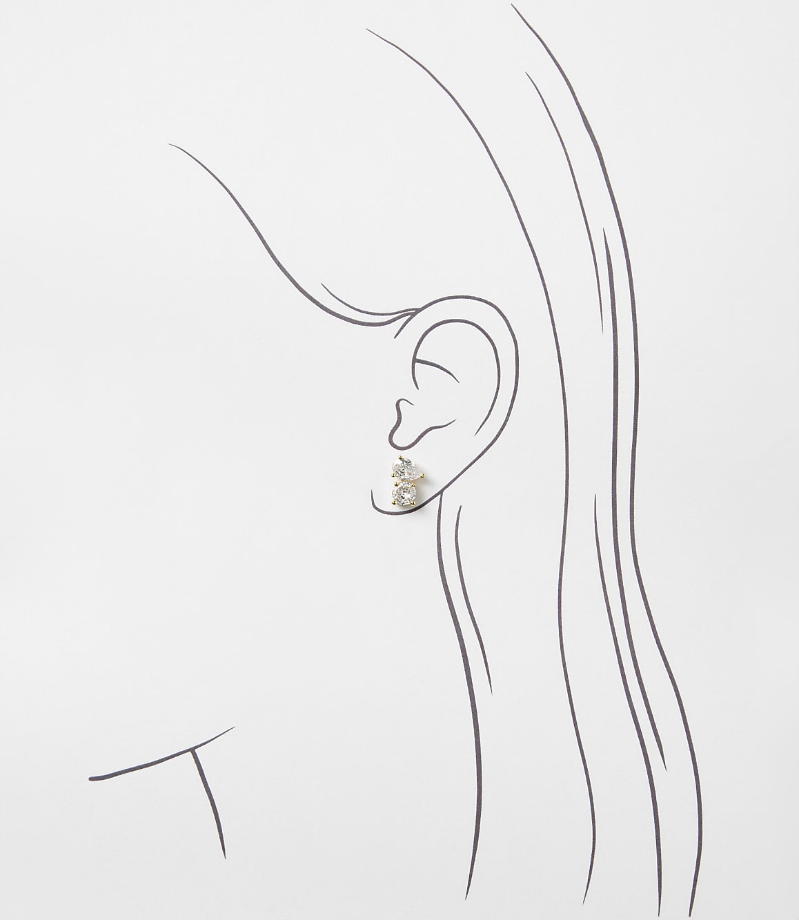 A sparkling diamond stud earring is placed on a minimalist line drawing of a woman's profile against a plain white background.