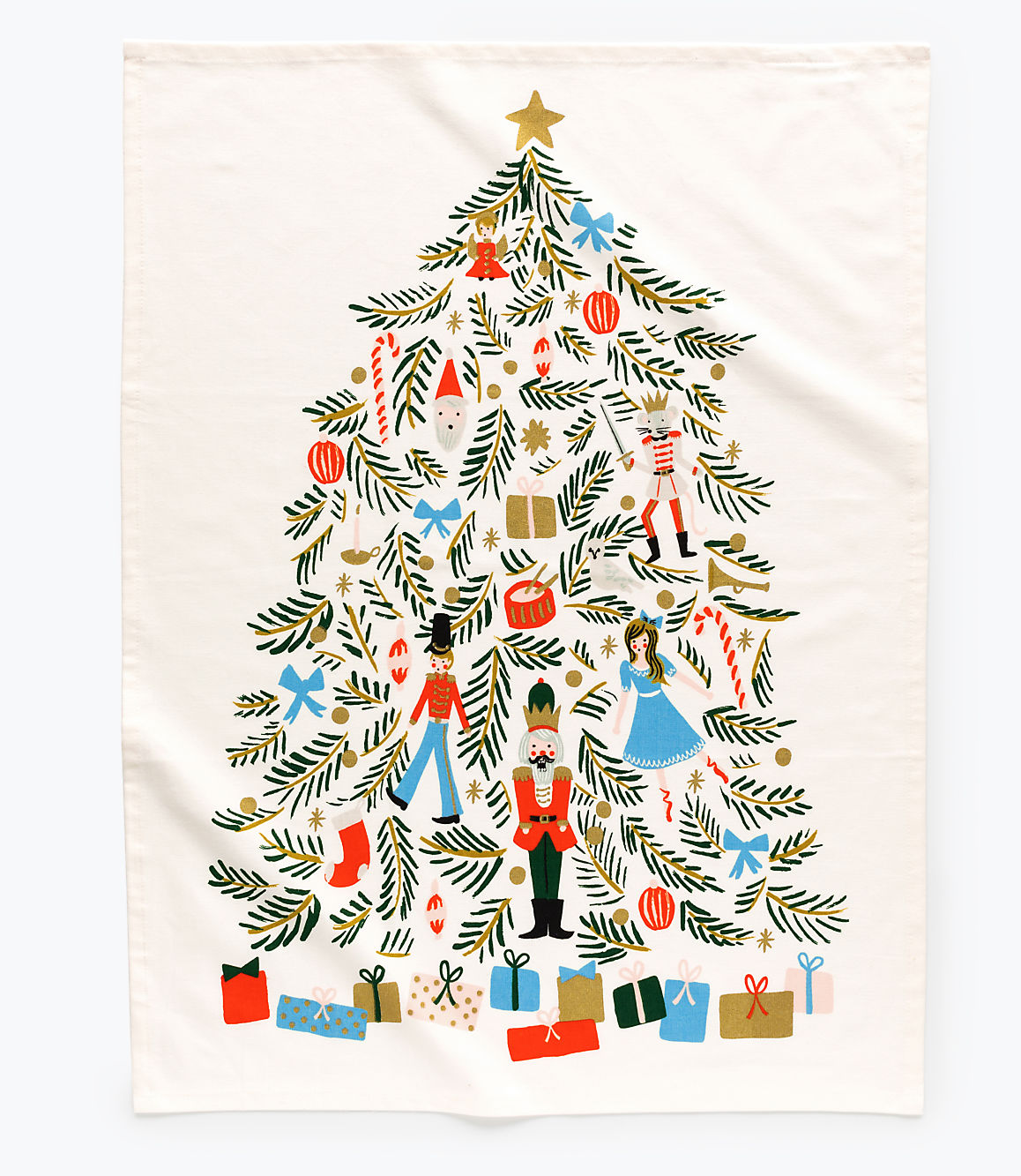A decorated Christmas tree filled with toys and ornaments stands against a plain white background with wrapped gifts at its base.