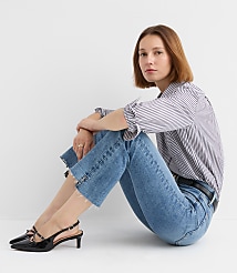 Petite Step Hem High Rise Kick Crop Jeans in Classic Mid Wash carousel Product Image 1