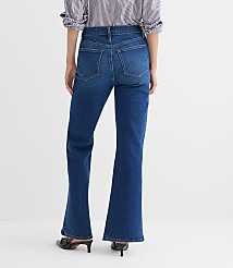 Petite Curvy High Rise Relaxed Flare Jeans in Medium Wash carousel Product Image 2