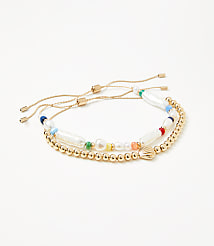 Pearlized Shell Pull Tie Bracelet Set carousel Product Image 1