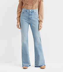 Petite Let Down Hem High Rise Relaxed Flare Jeans in Vintage Light Indigo Wash carousel Product Image 2