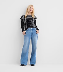 Rivete Tall Fresh Cut Mid Rise Loose Flare Jeans in Light Wash carousel Product Image 1