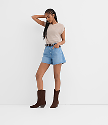 Rivete Petite High Rise Cut Off Denim Shorts in Mid Wash carousel Product Image 1