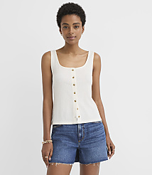 A woman in a white waffle-knit tank top and denim shorts stands against a plain white background. carousel Product Image 1