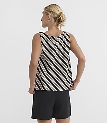 A woman in a striped tank top and black shorts stands against a plain white background. carousel Product Image 2