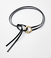 A black leather belt with a gold ring is laid out on a white background. carousel Product Image 1