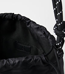 A black drawstring bag with a white-speckled rope strap is shown against a plain white background. carousel Product Image 2