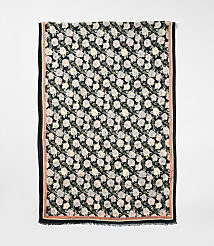 A floral scarf with a black background and pink border is laid out against a plain white background. carousel Product Image 2