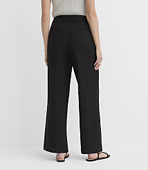 A person wearing black wide-leg pants and sandals stands against a plain white background. carousel Product Image 2